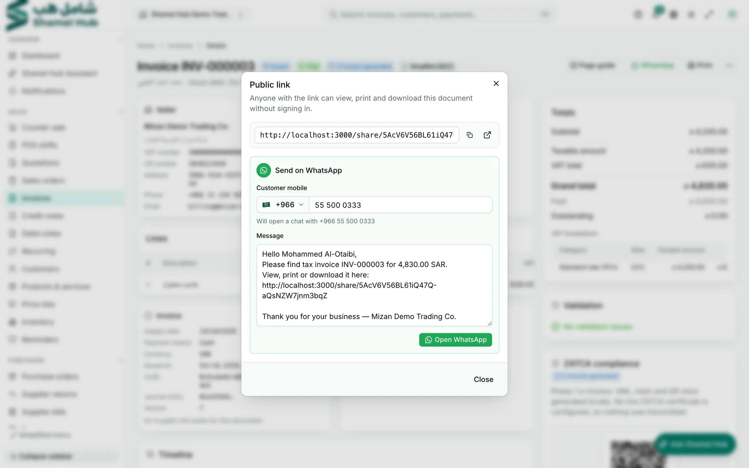 Invoice page with the WhatsApp share dialog open